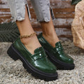 Plus size women's slip-on loafers with a chunky platform heel in black, green, and wine red colours.