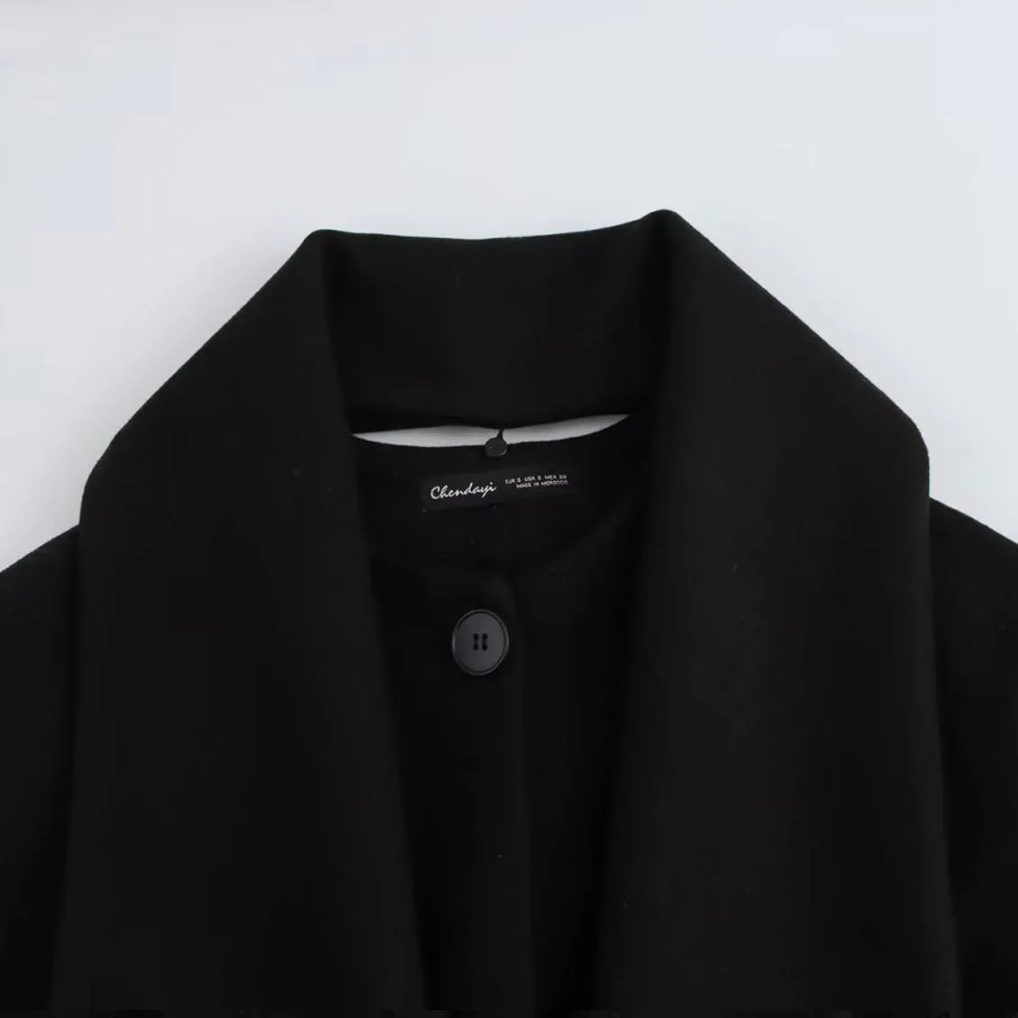 Women's long black overcoat with artificial fur collar, pockets and extended 100cm length