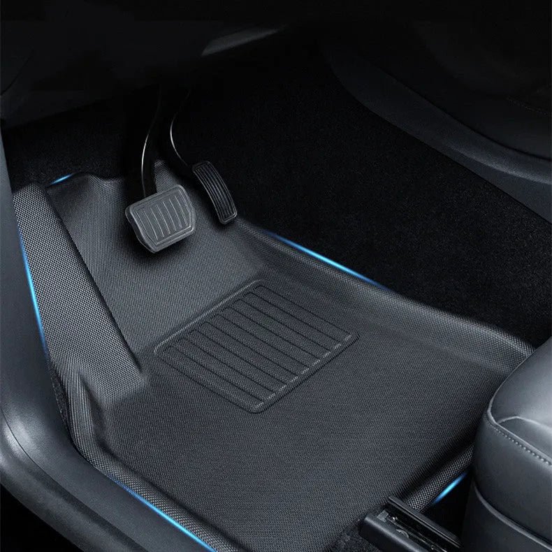 TPR floor mat set for Tesla Model Y showing footwell, storage box, and tailbox mats.