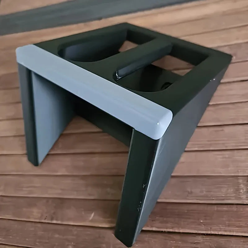Black plastic punk-style pistol display stand for airsoft guns