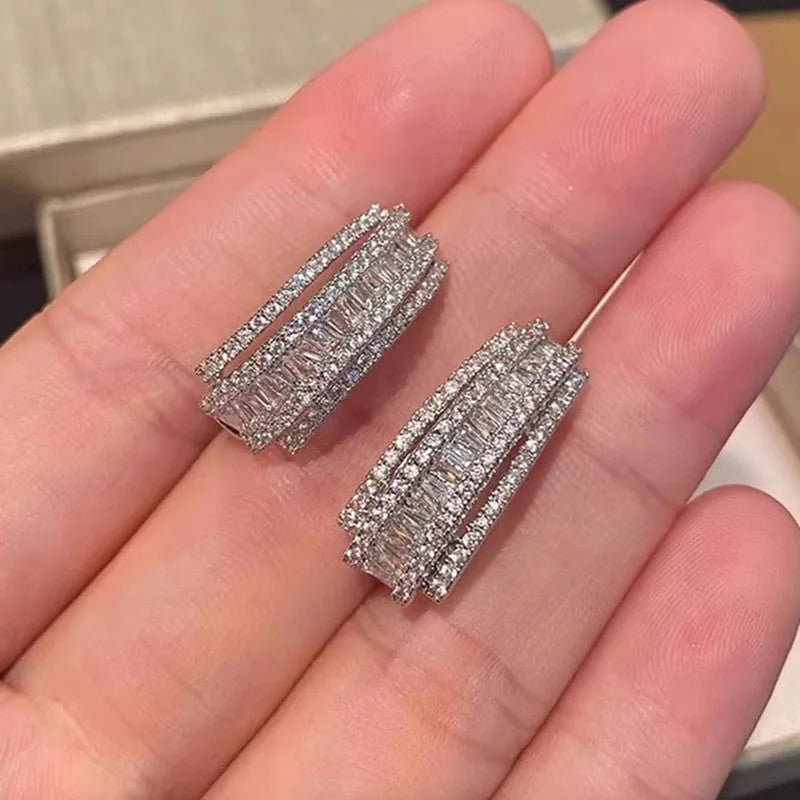 Geometric zircon stud earrings in white gold colour plating for women casual wear
