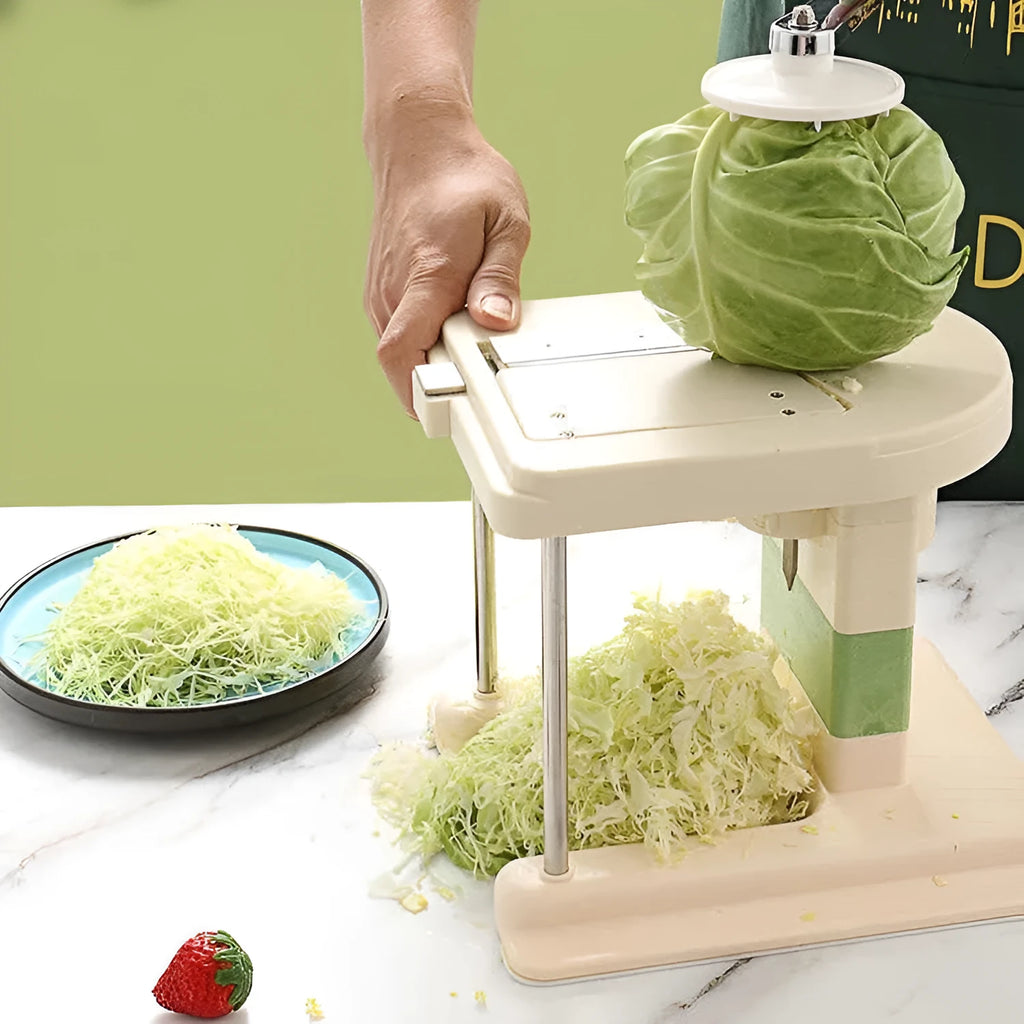 Beige stainless steel multifunctional vegetable slicer chopper and grater kitchen tool.