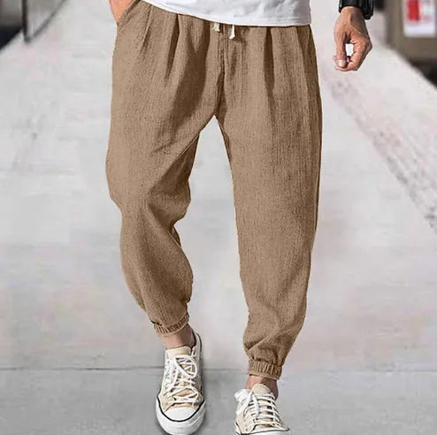 Men's loose-fit cotton trousers with elastic ankle cuffs in multiple colour options