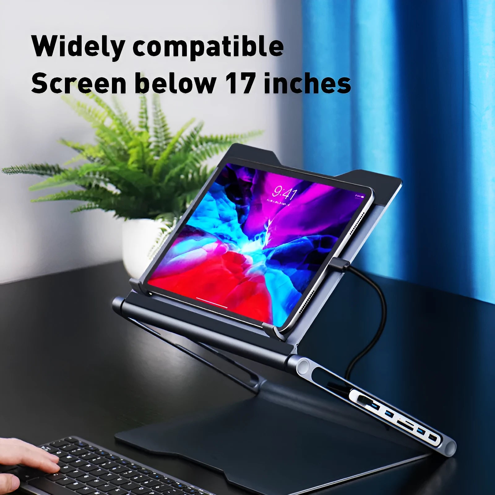 Aluminium laptop stand with 8-in-1 docking station in deep space grey on a desk