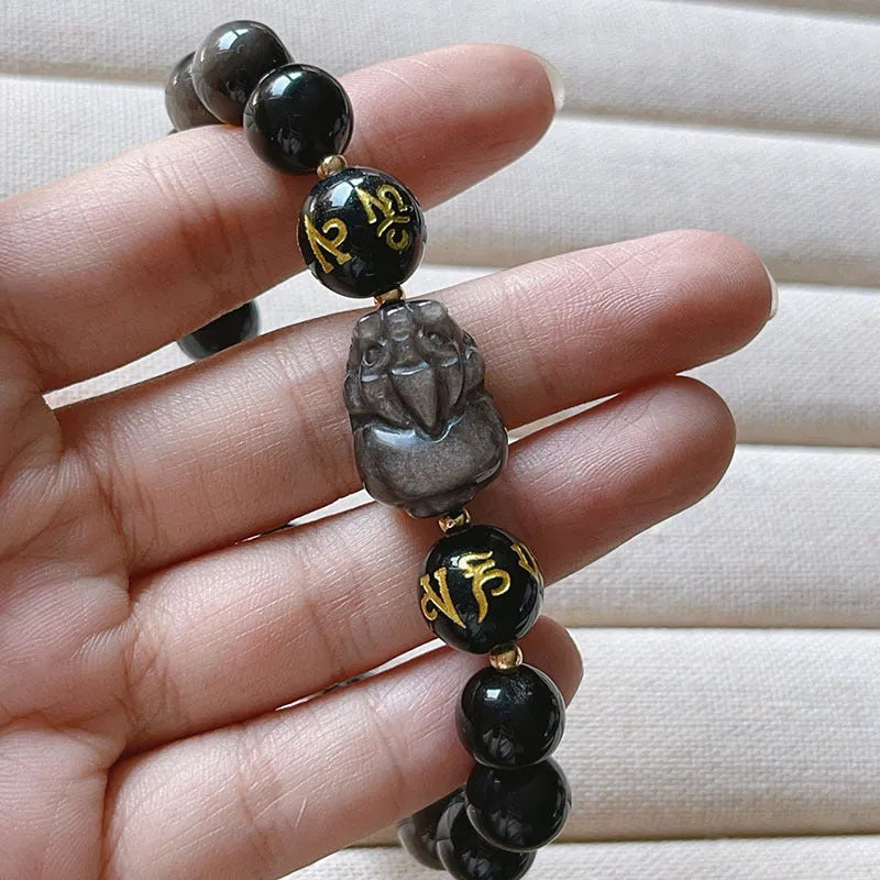 Man's Silverstone beaded bracelet with engraved Chinese proverbs and zodiac symbols.