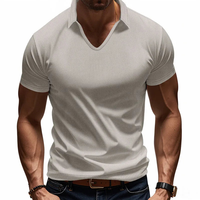 Men's loose casual V-neck short sleeve t-shirt in a light solid colour.