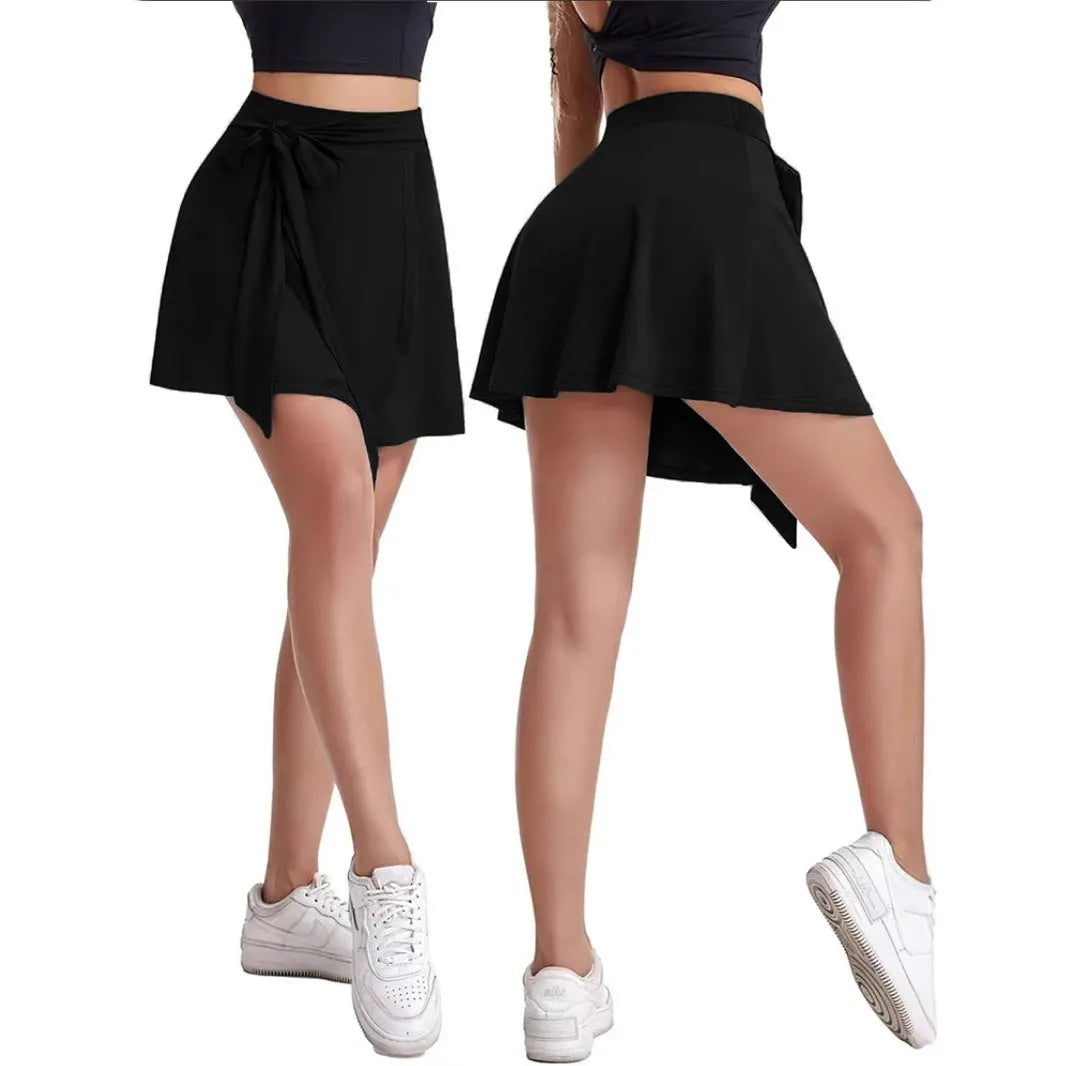 Black high-waisted sports culotte skirt with built-in shorts for anti-exposure coverage.