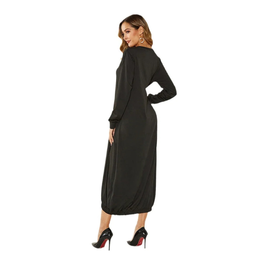 Women's black lantern dress with lace-up crew neck and loose silhouette