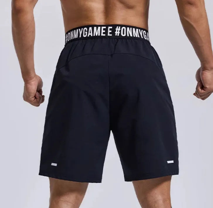Men's black loose sports shorts with elastic waistband for workout and running