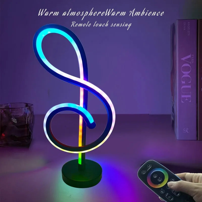 Black musical note shaped Bluetooth light with remote control and RGB colour changing capabilities