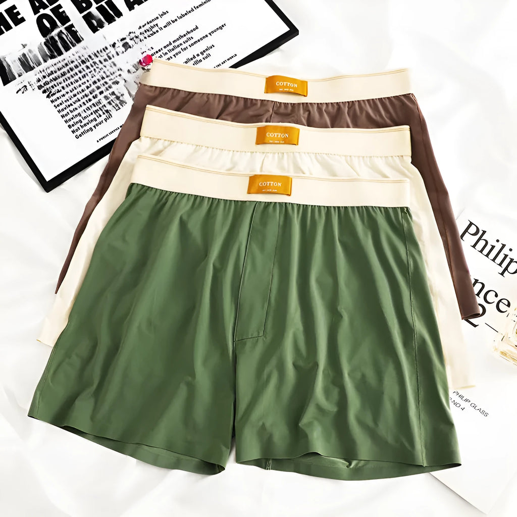 Men's ice silk boxer shorts in solid colours showing loose fit and mid waist design