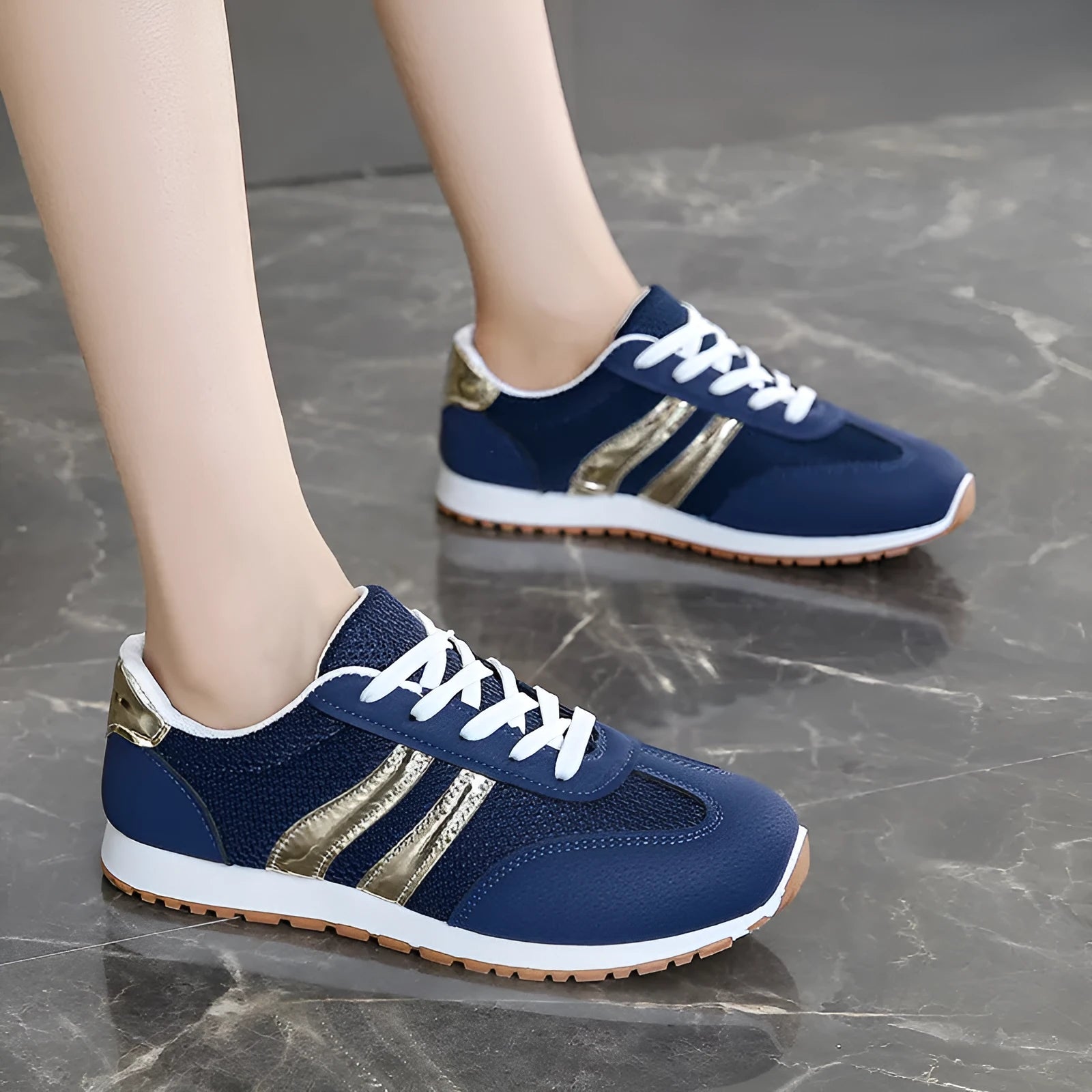 Blue women's casual tennis shoes with cross shoulder straps and rubber soles