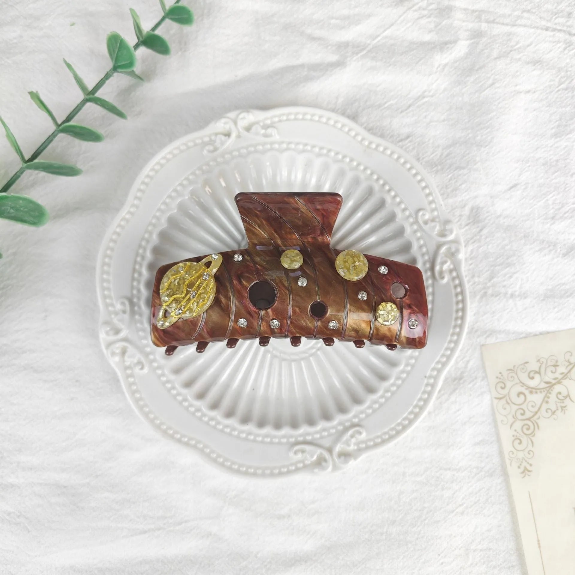 Oversized star moon barrette in celestial colours with irregular minimalist design
