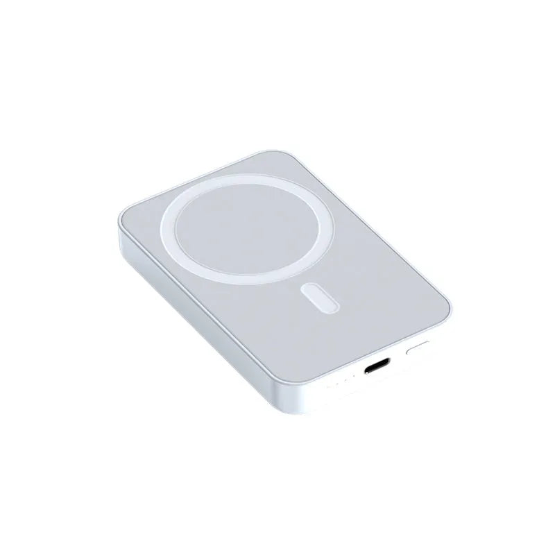 Mobile wireless magnetic power bank with plastic housing showing colour options pink purple white