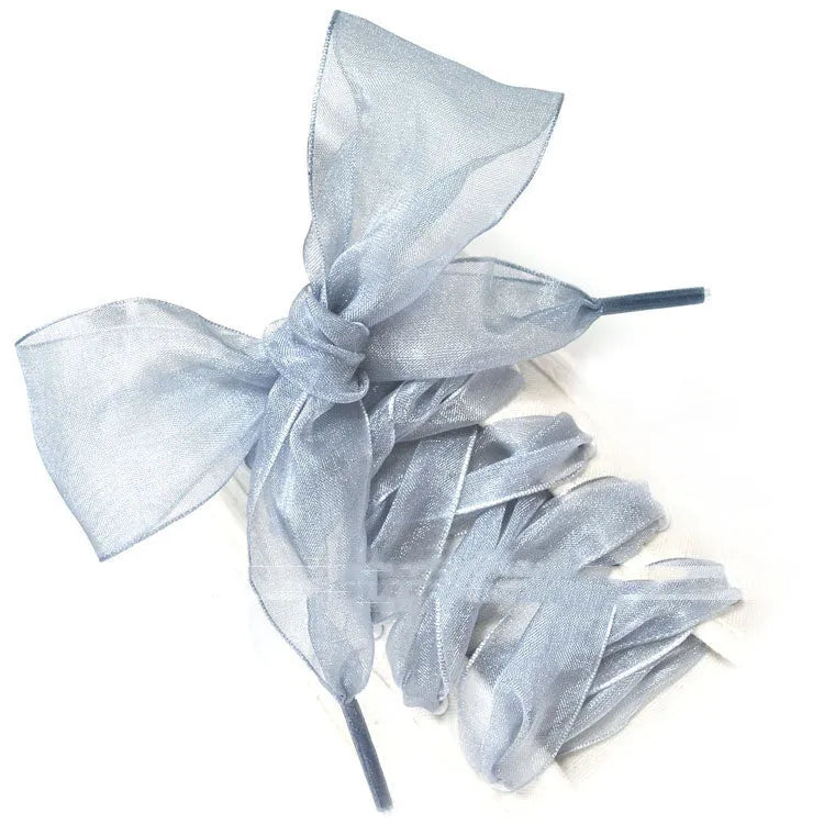 Wide transparent lace shoelaces in multiple solid colours showing 4cm width and length.