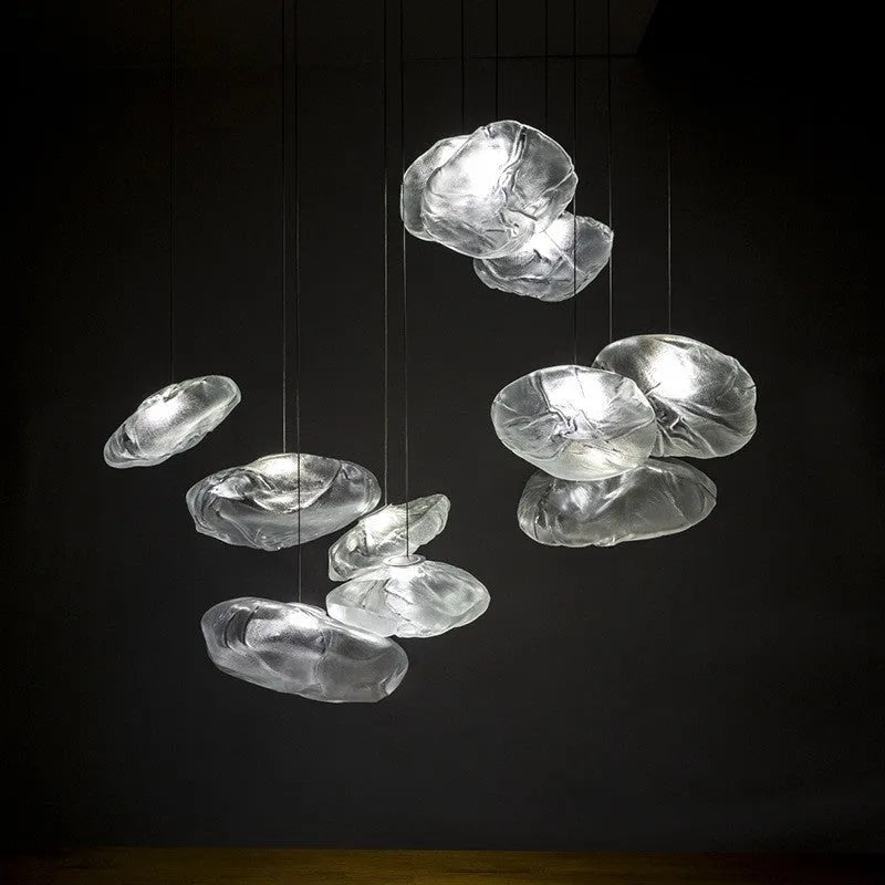 Modern glass and fabric chandelier light fixture in amber, clear or smoke grey.