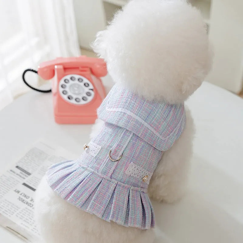Purple and pink polyester pet clothing for small dogs and cats, showing sizes S, M, L, and XL.