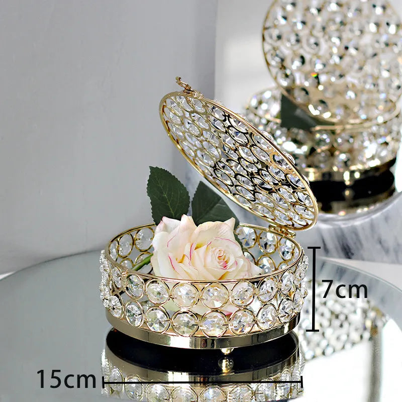 French gold European style jewellery storage box with transparent crystal glass sides and lid.