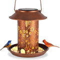 Solar-powered iron art bird feeder lamp with hummingbird pattern design for outdoor garden use