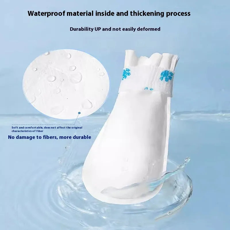 White disposable waterproof shoe covers for dogs with non-slip soles in two size options