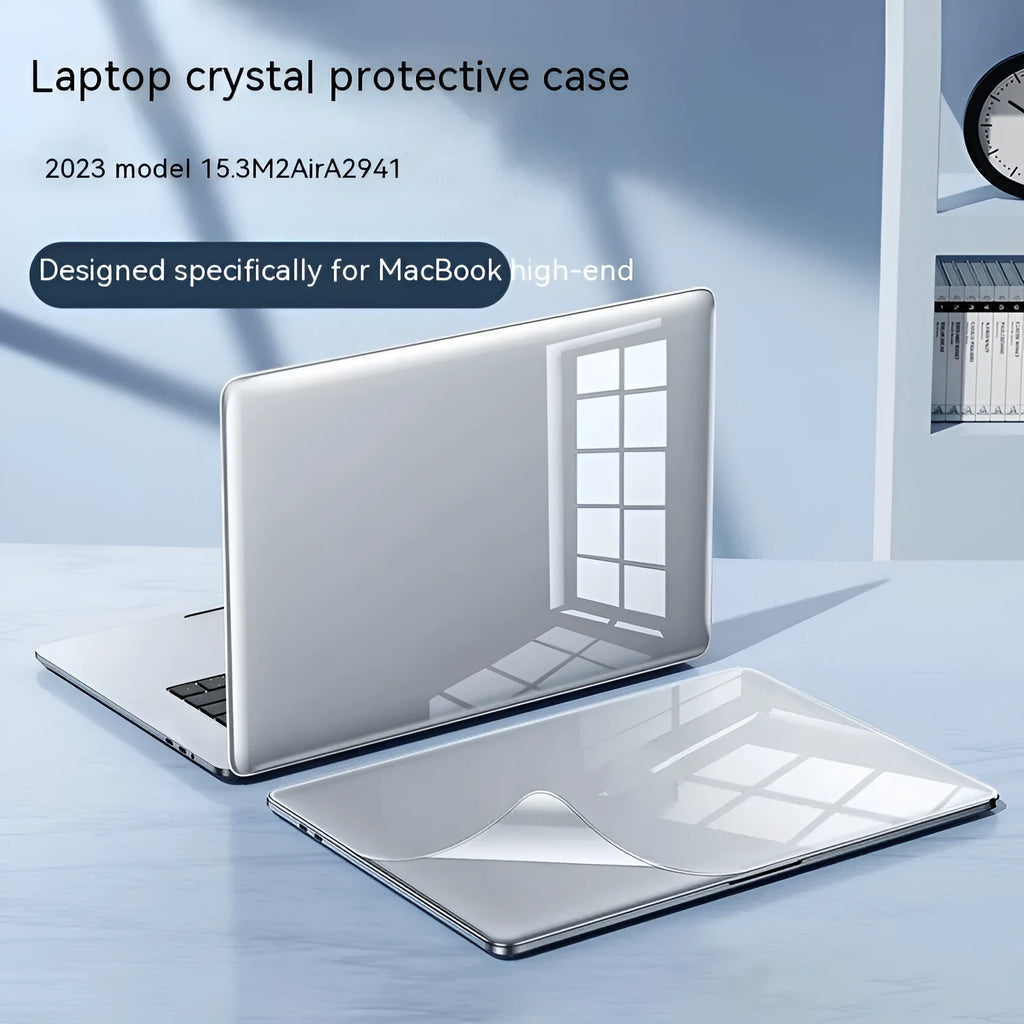 Hard plastic protective case fitted on a silver MacBook Pro laptop, showing clear transparent finish.