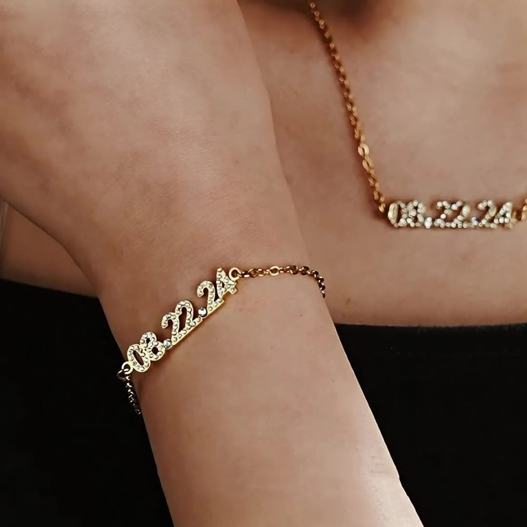 Stainless steel digital bracelet with diamond studded numbers, matching necklace option