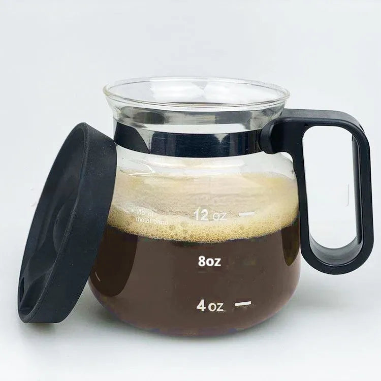 Transparent borosilicate glass coffee maker with silicone cover showing 355-473ml capacity range