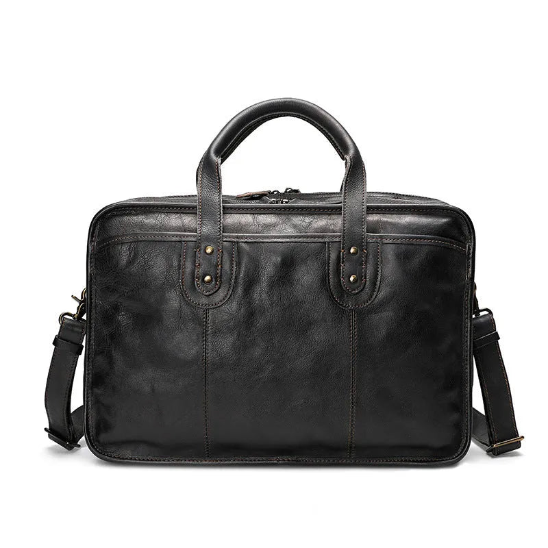Men's vintage leather briefcase in black showing internal organisation pockets and 42cm width