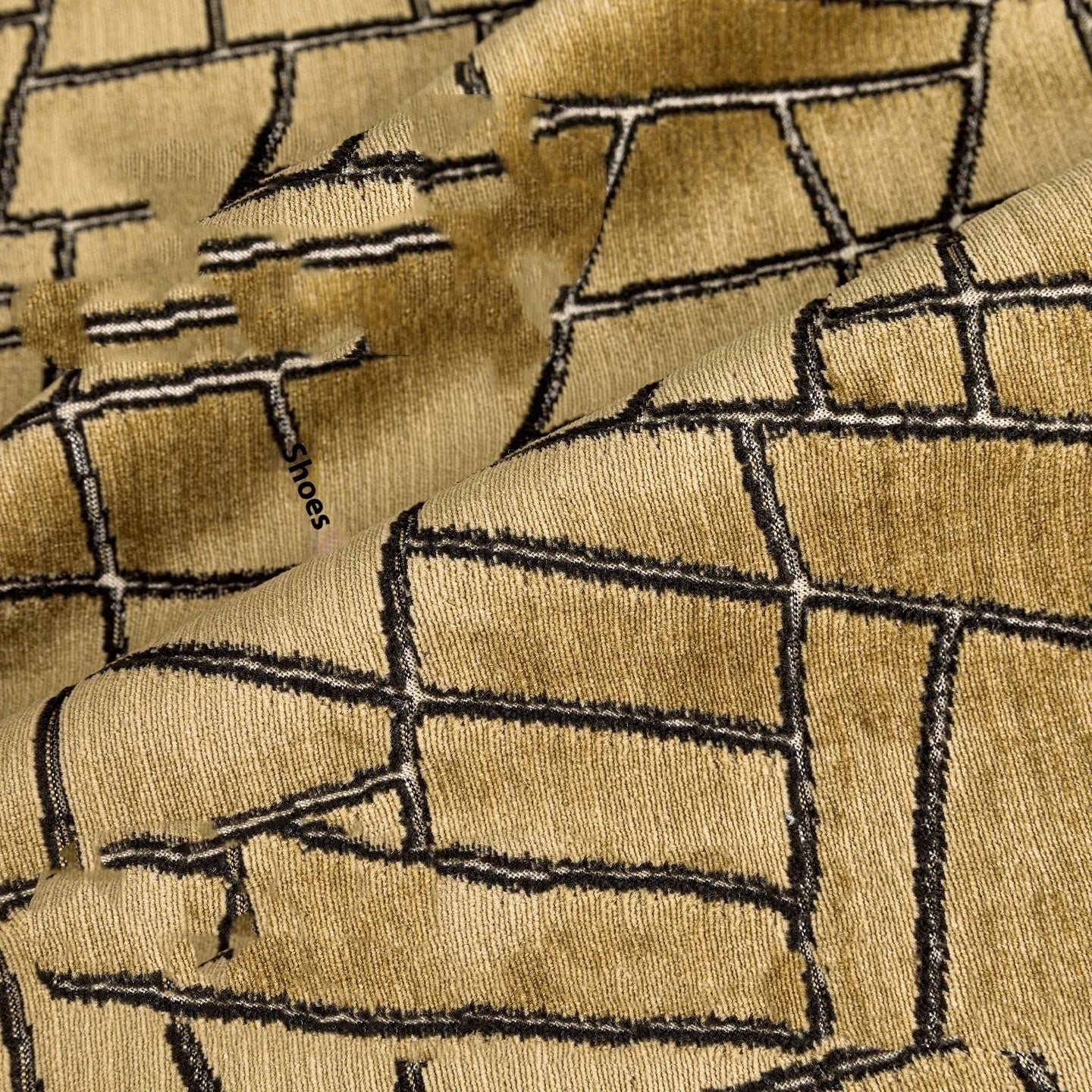 Gold geometric pattern decorative cushion cover shown in square and waist pillow sizes on a grey sofa.