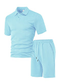 Men's patterned cloth casual suit comprising a short sleeve polo shirt and trousers on a hanger.
