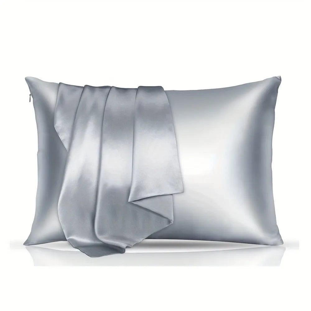Pair of solid colour satin cloth pillowcases in polyester fibre available in twelve colours and four sizes