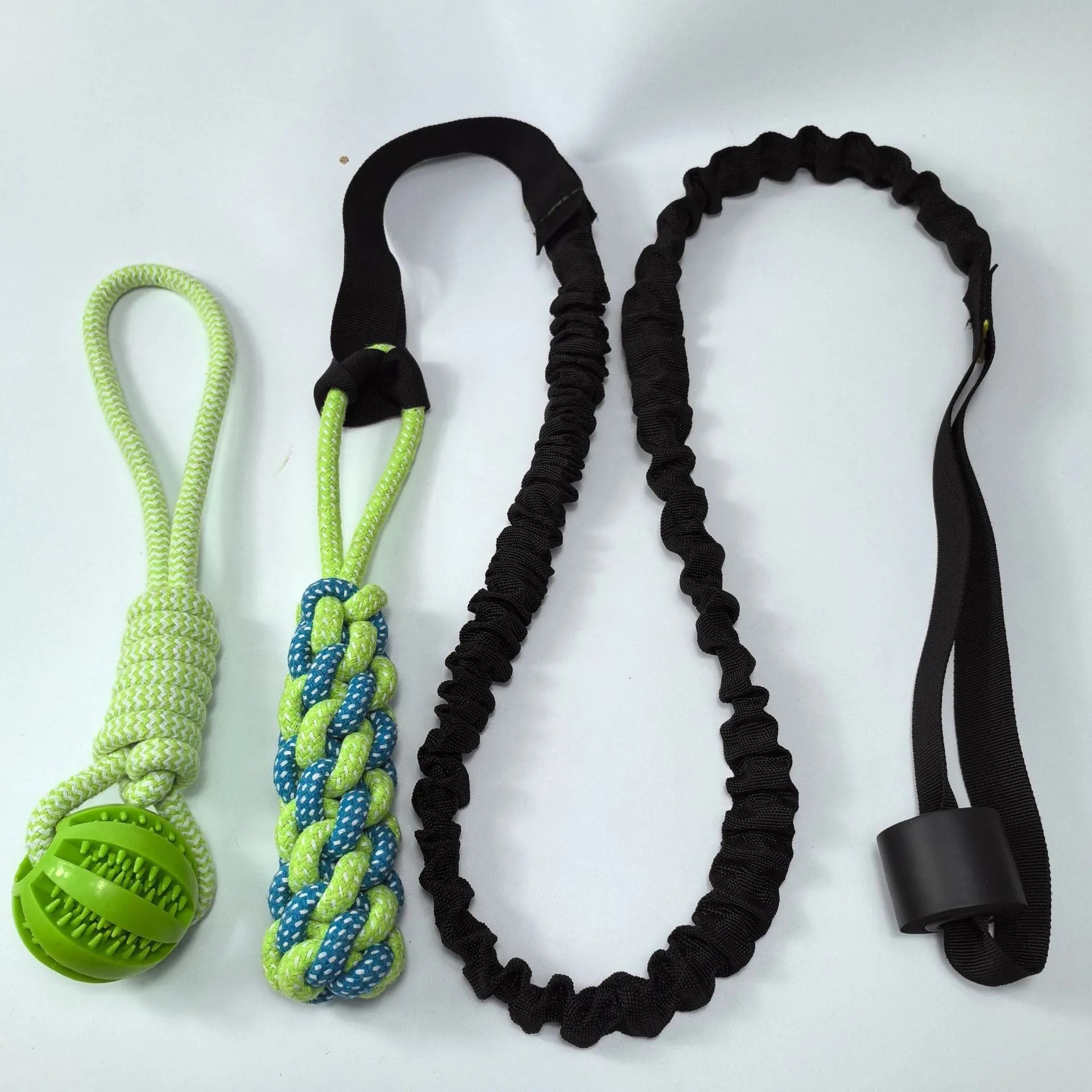 Cotton thread dog tug rope toy with green ball attachment for bite and pull play
