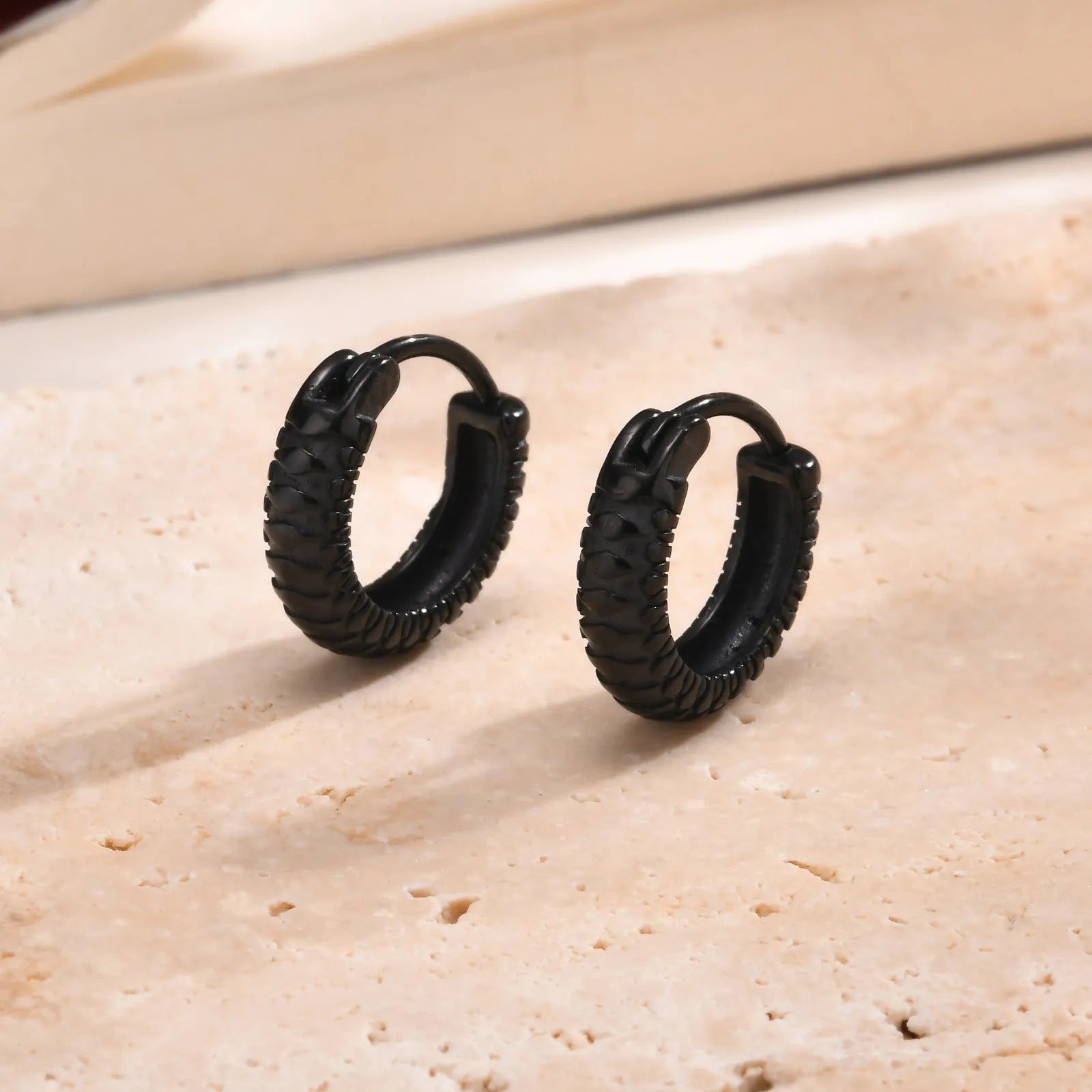 Stainless steel snake pattern hip hop ear rings in black or gold colour options