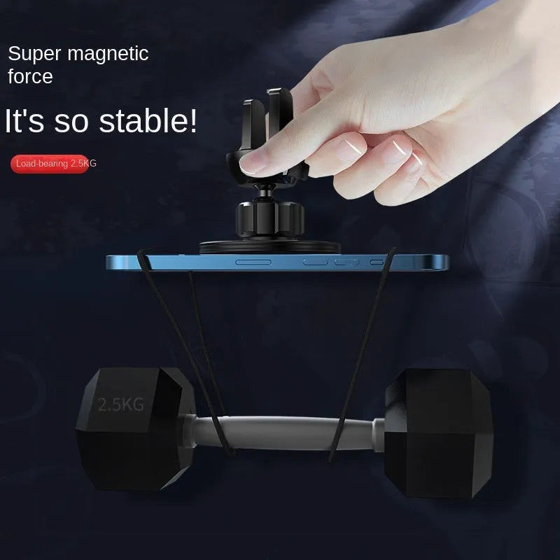 Black aluminium alloy magnetic suction car phone holder mounted on a car air vent.