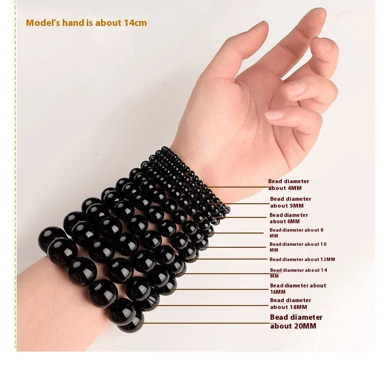 Natural Smokey Violet Hetian Jade bracelet with straight cut beads on a wrist.