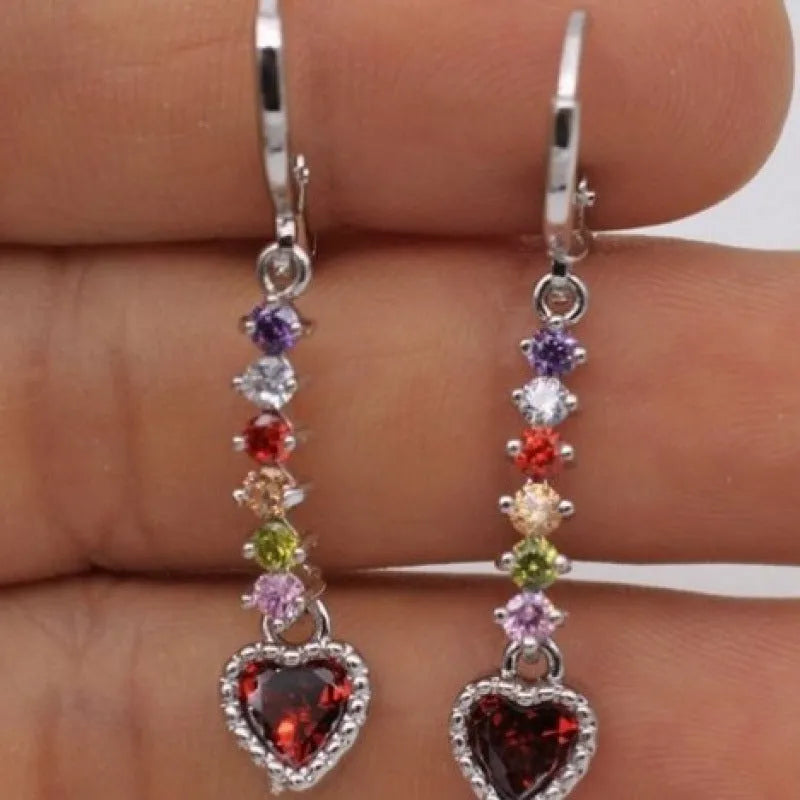 Women's heart-shaped alloy earrings with a shiny electroplated finish in gold and silver colours.