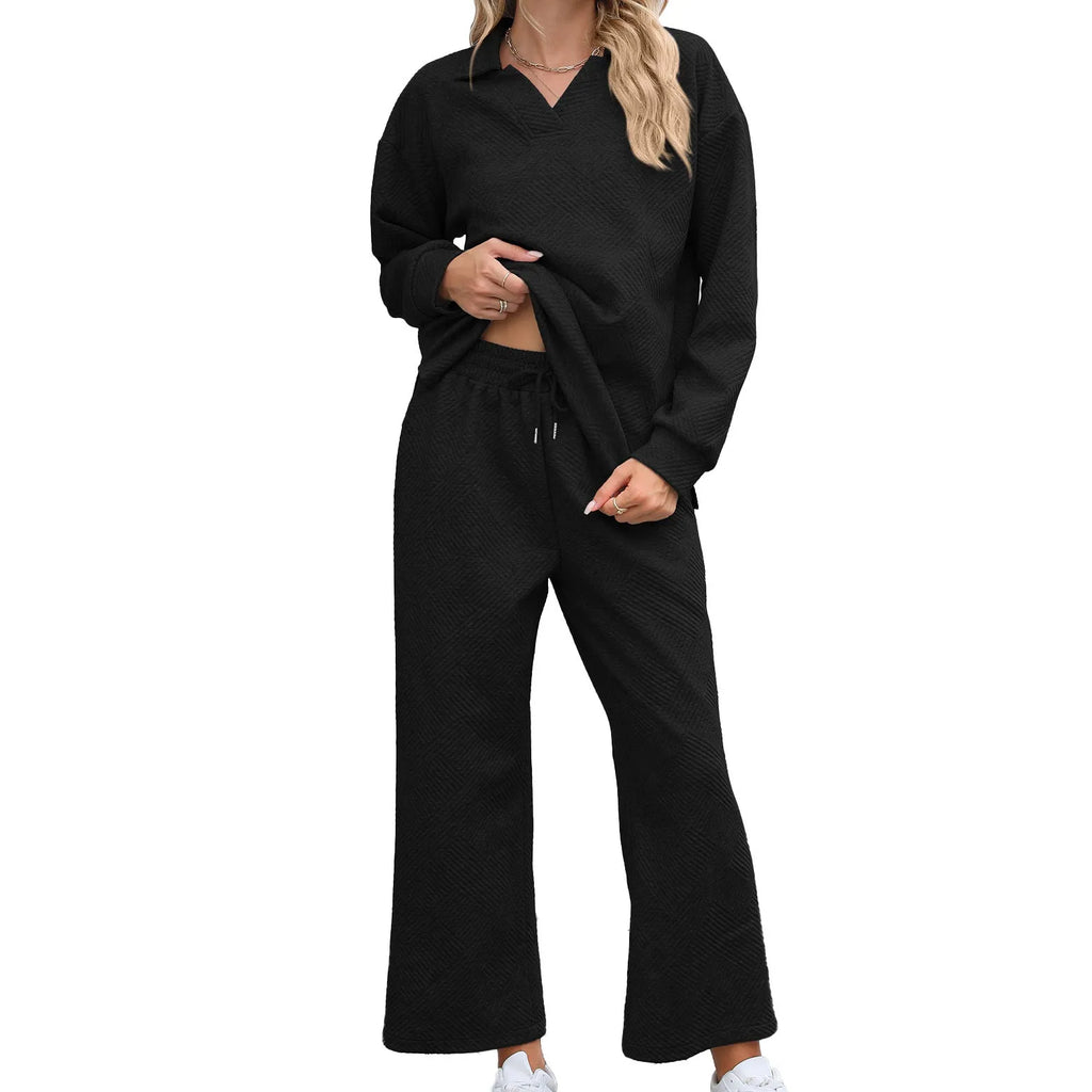 Women's geometric patterned knitted suit set with lapel sweater and cropped trousers in multiple colours.
