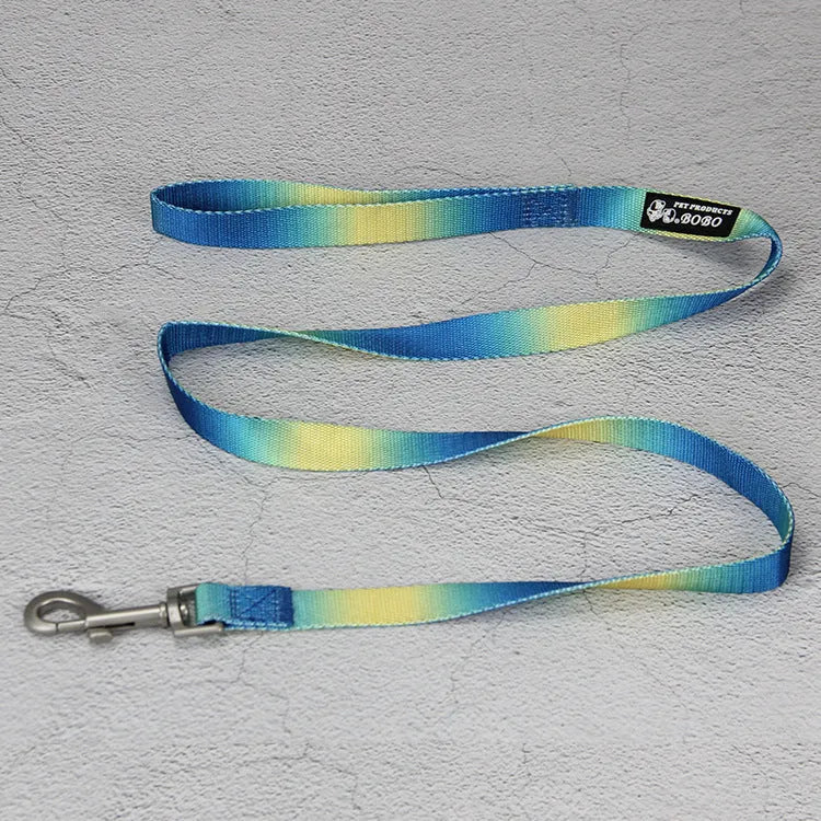 Gradient colour nylon dog leash in pink and yellow, shown as a collar-style lead.
