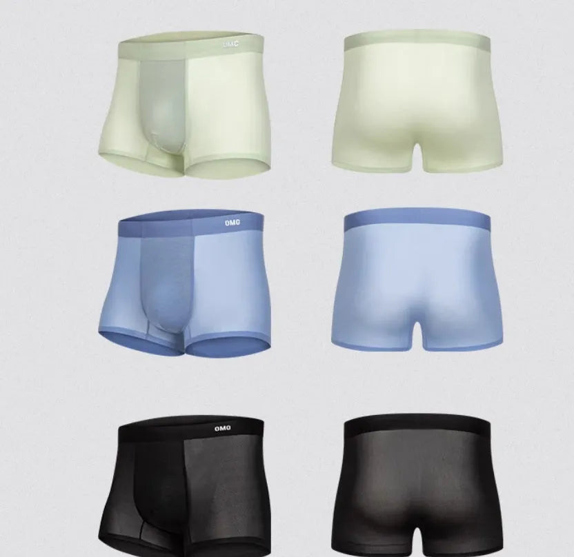 Men's antibacterial seamless sports underwear in four colours: black, blue, green, and silver.