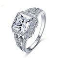 Geometric platinum colour zircon ring with quadrilateral design and hollow ornament construction