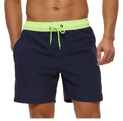 Men's blue drawstring shorts with a zippered pocket and stitching waist detail