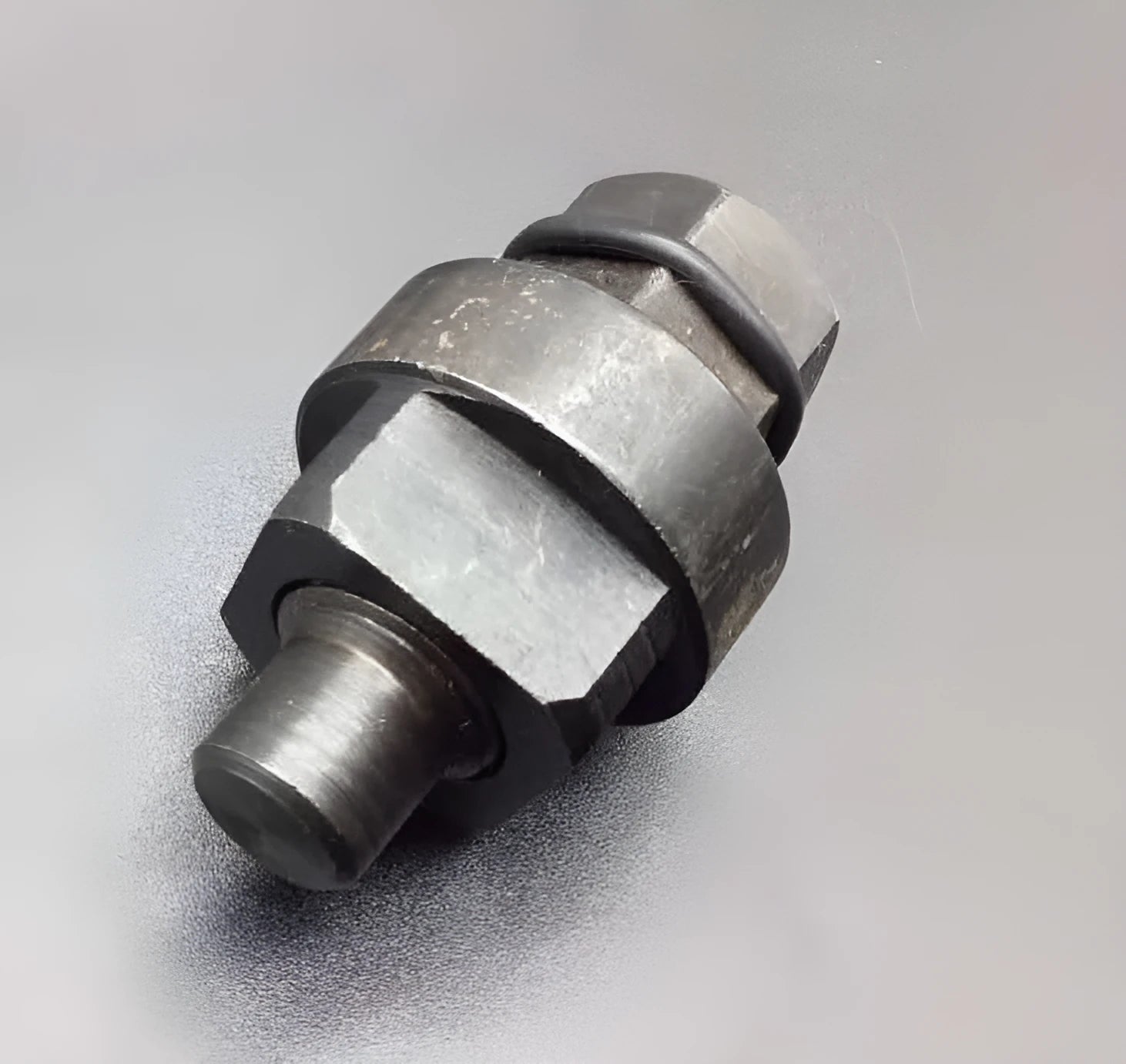 Aodi T40058 crankshaft rotating sleeve and adapter tool for Audi engine timing service.