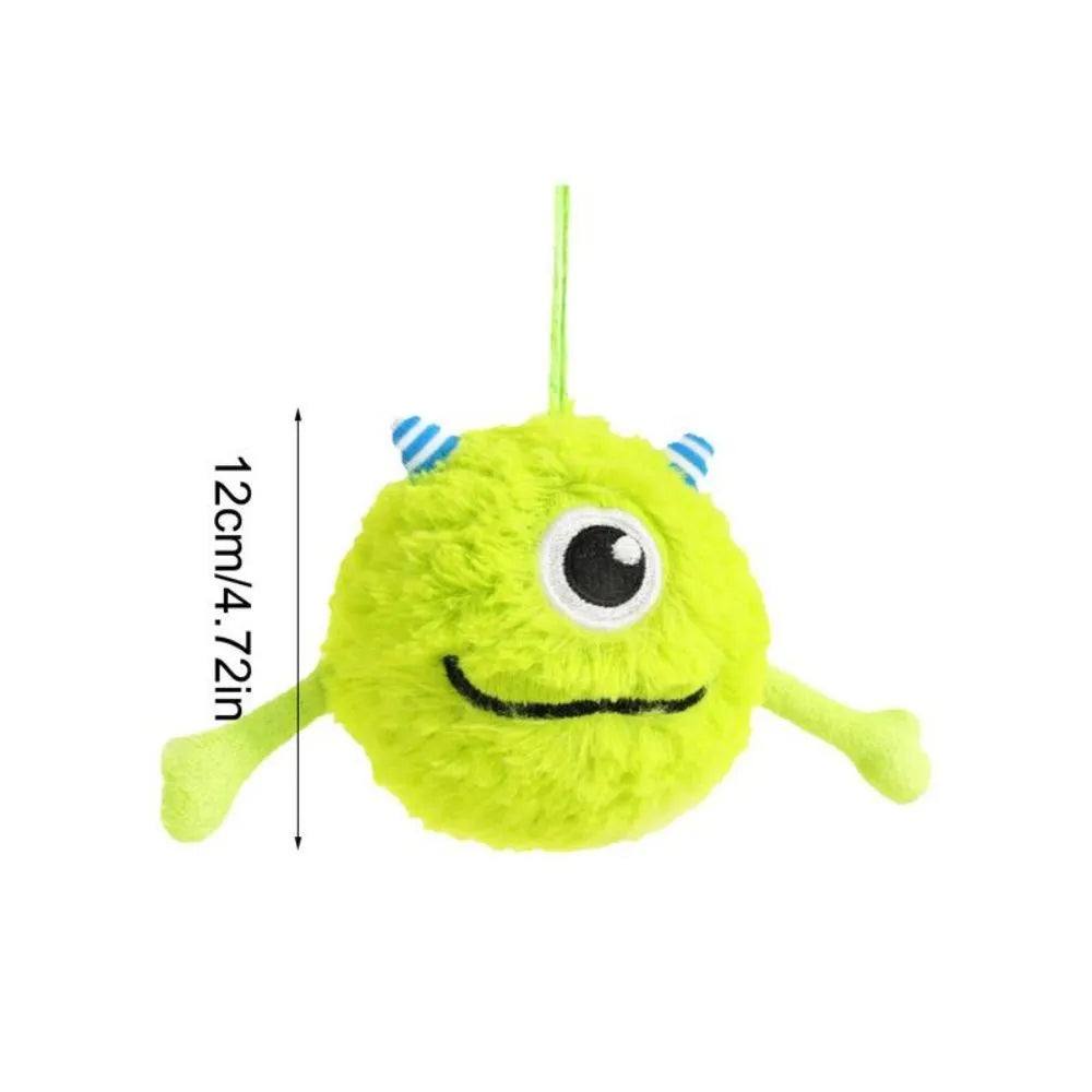 Green plush and TPR sound-activated interactive dog teething toy ball, 12cm diameter.
