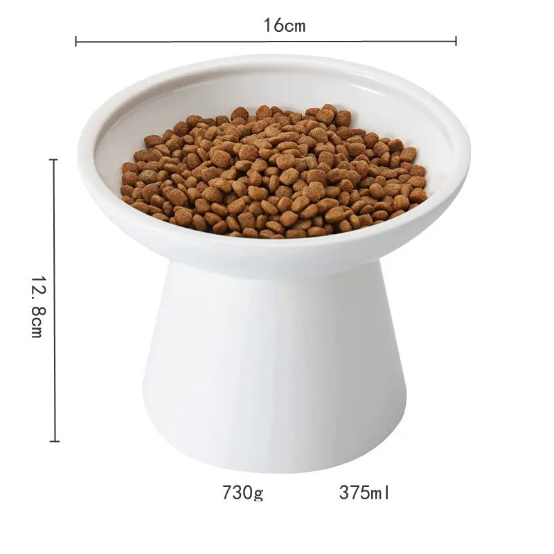 Blue ceramic elevated cat food bowl with wide shallow design next to a matching water bowl.