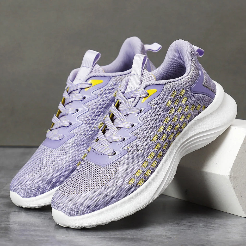 Women's lavender purple Flyknit running shoes with striped pattern and mesh design for sports