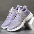 Women's lavender purple Flyknit running shoes with striped pattern and mesh design for sports