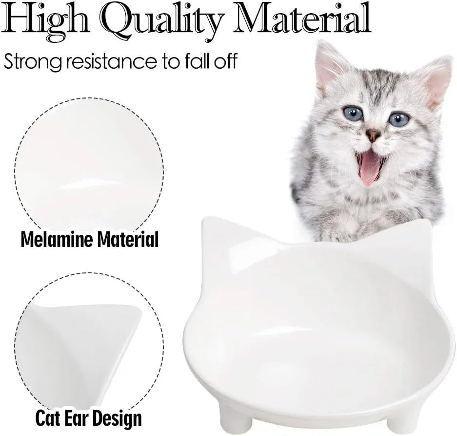 White and black shallow melamine pet bowls with non-slip rubber bases on a floor.