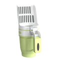 Grey cat litter scoop attached to a waste bin with a lid, showing foldable bottom and non-slip handle.