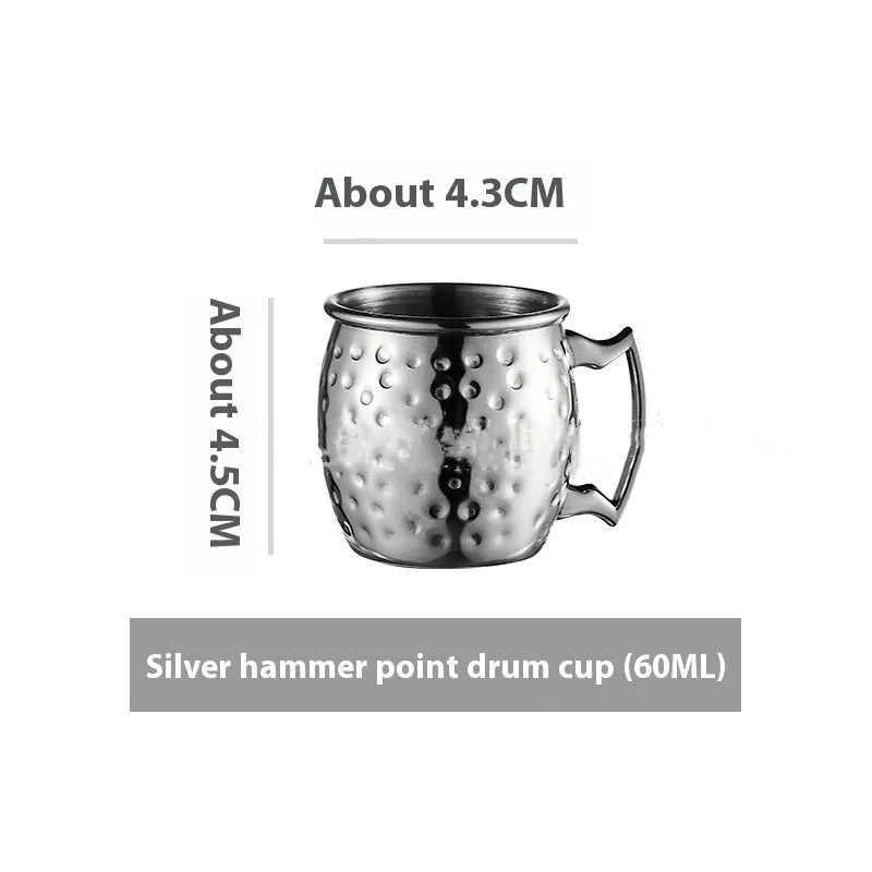 Stainless steel Moscow Mule cup with copper plating in hammer point style showing metallic finish.