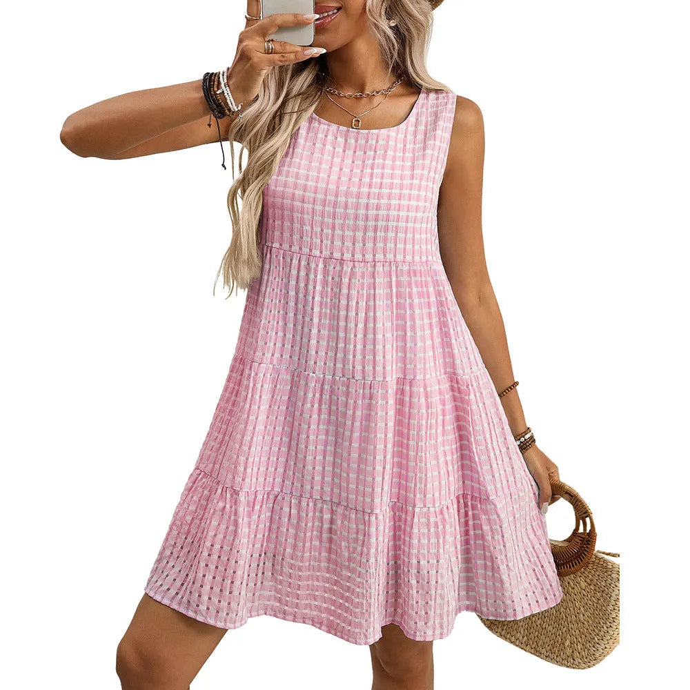 Women's light blue sleeveless plaid dress with an oversized swing skirt and high waist.
